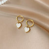 Twisted geometric white shell earrings
