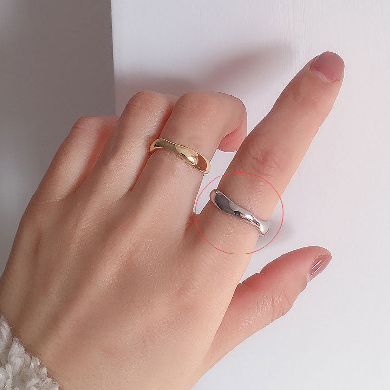 Adjustable wavy opening ring