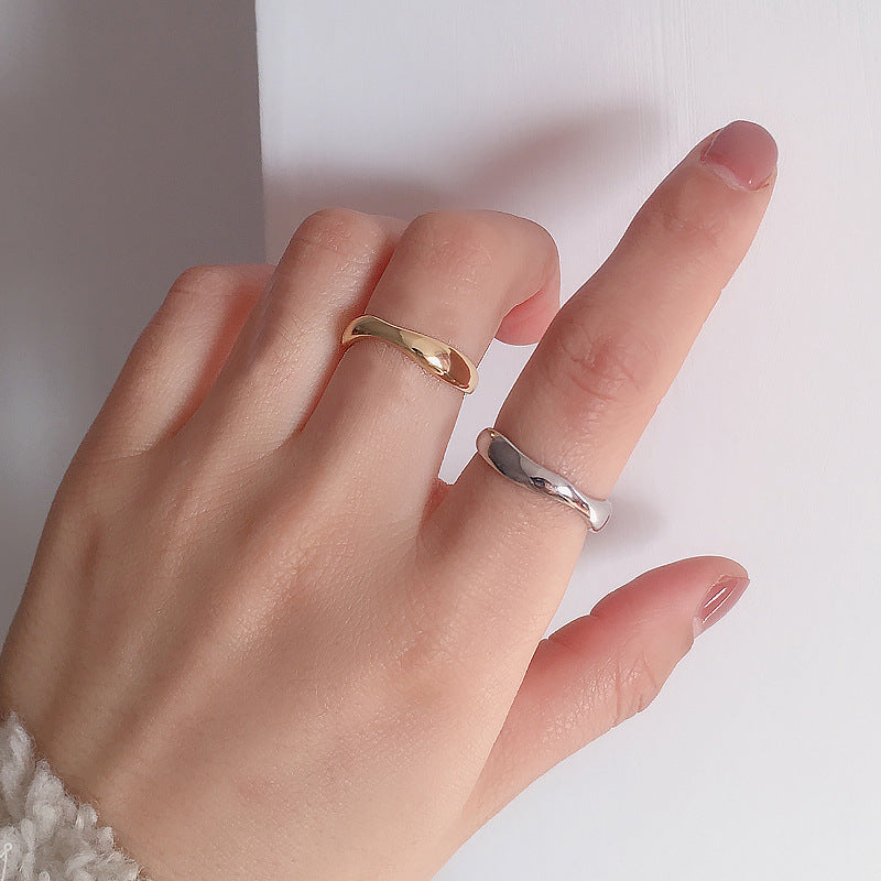 Adjustable wavy opening ring