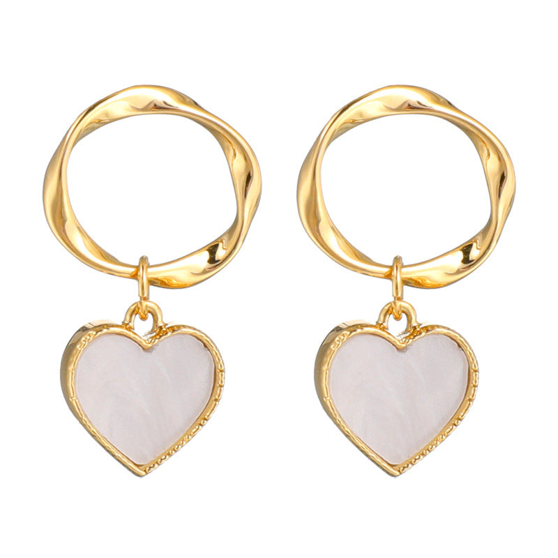 Twisted geometric white shell earrings