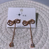 Bow tassel earrings