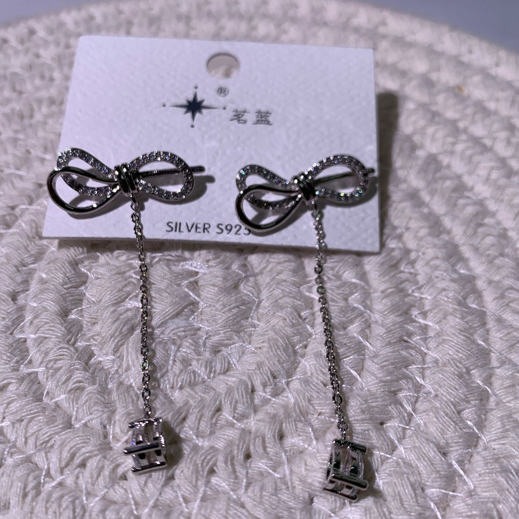 Bow tassel earrings