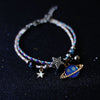 A Pair Of Women's Star And Moon Bracelets