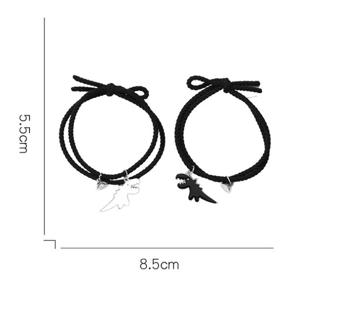 A Pair Of New Cartoon Black And White Dinosaur Matching Bracelets