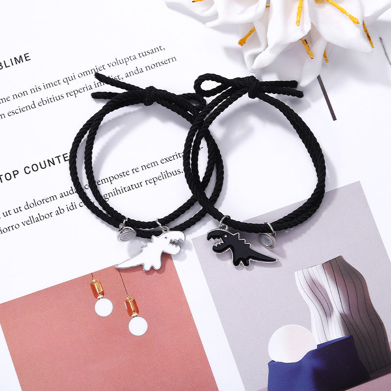 A Pair Of New Cartoon Black And White Dinosaur Matching Bracelets