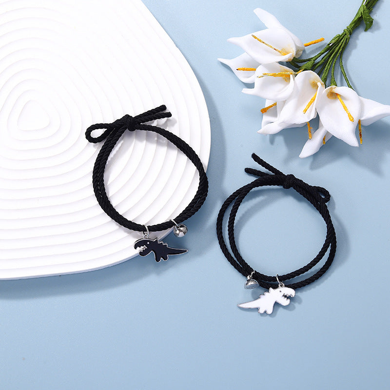 A Pair Of New Cartoon Black And White Dinosaur Matching Bracelets