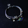 A Pair Of Women's Star And Moon Bracelets
