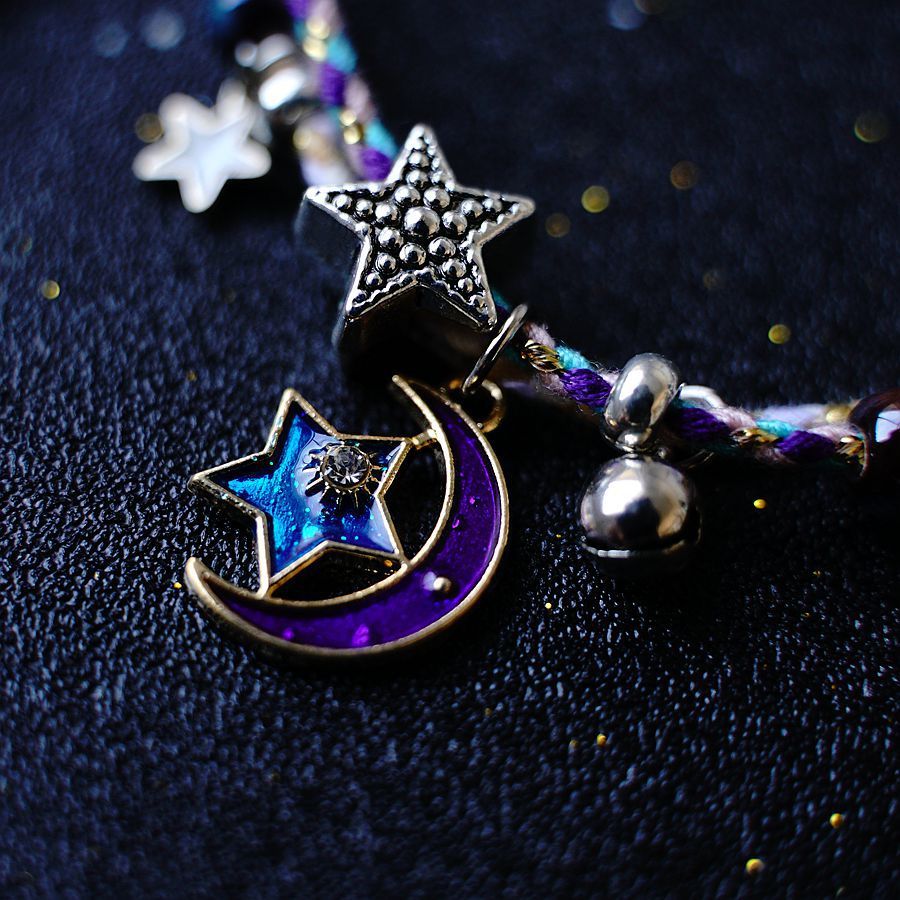 A Pair Of Women's Star And Moon Bracelets