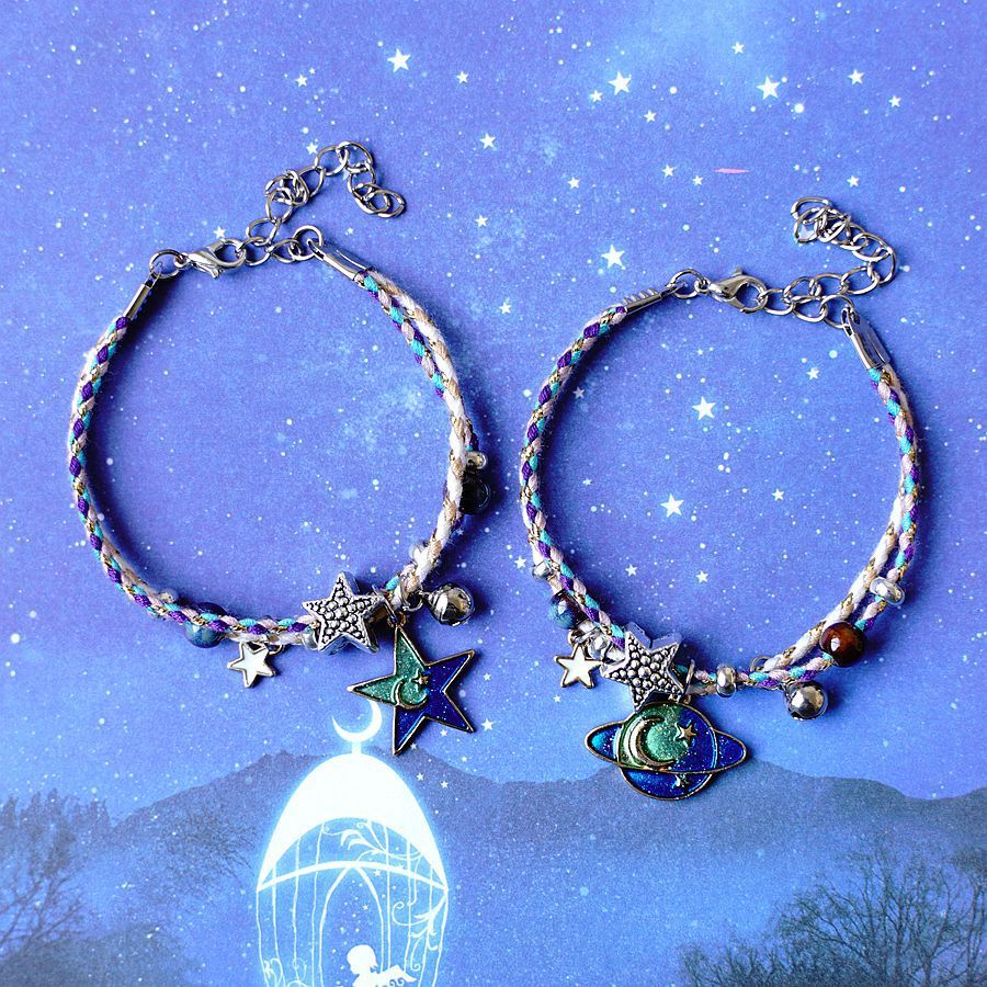 A Pair Of Women's Star And Moon Bracelets