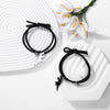 A Pair Of New Cartoon Black And White Dinosaur Matching Bracelets