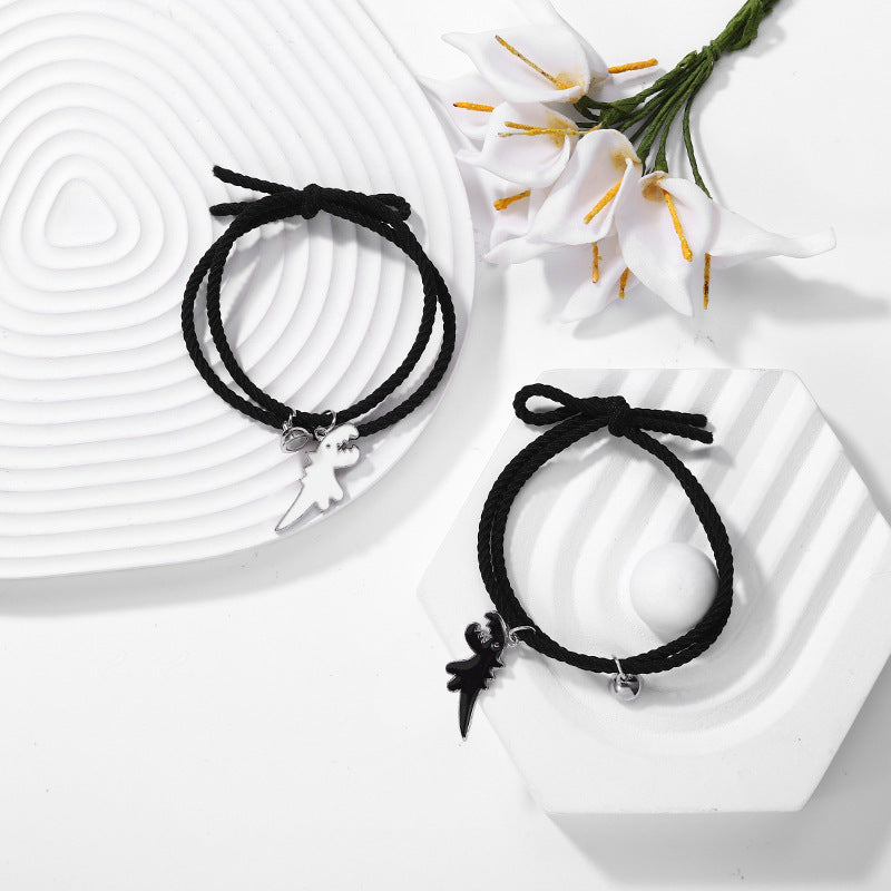 A Pair Of New Cartoon Black And White Dinosaur Matching Bracelets
